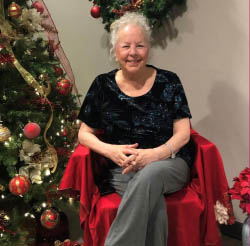 senior resident of cabot cove of largo with christmas tree