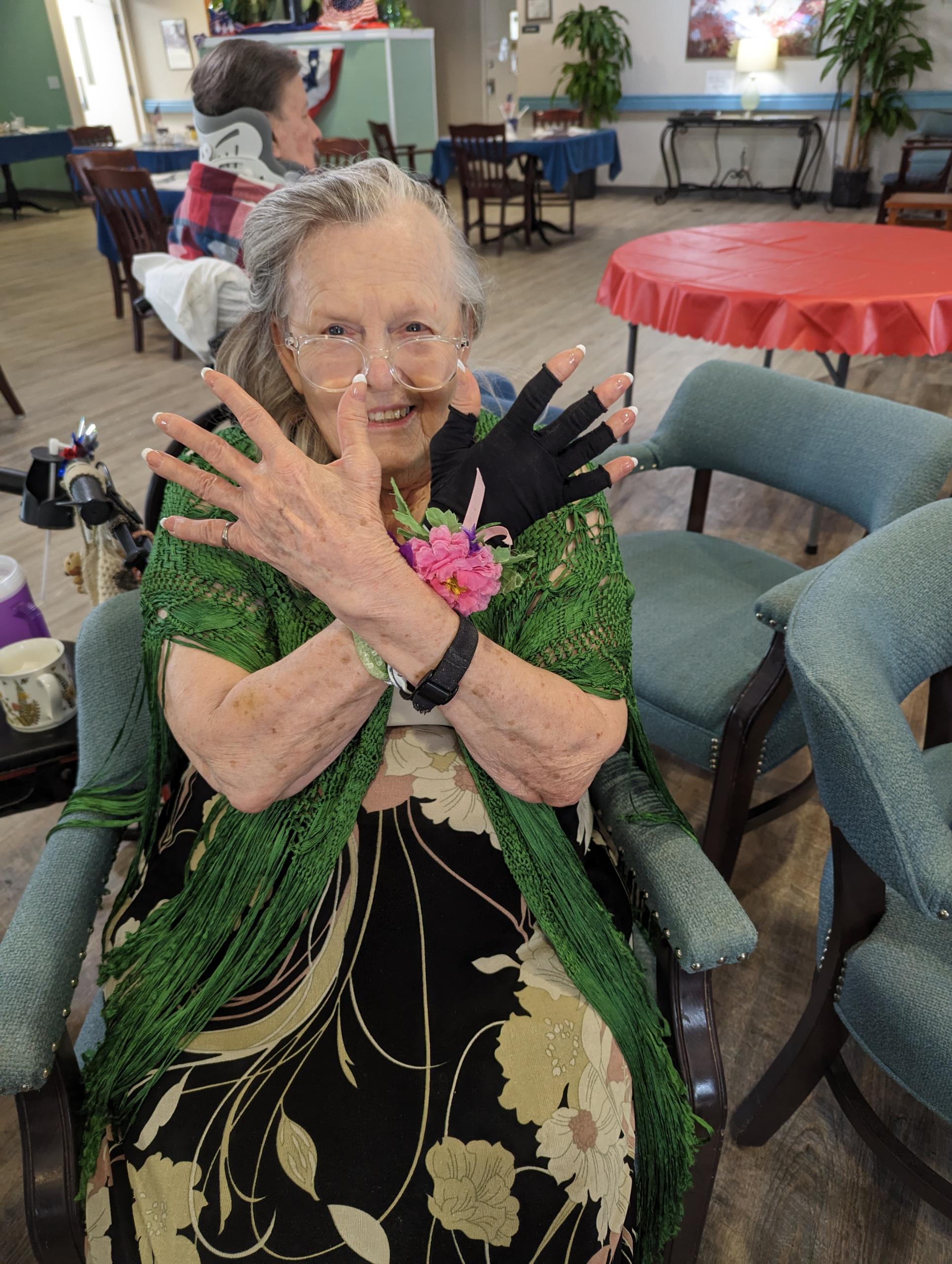 assisted living resident manicure showing her nails off