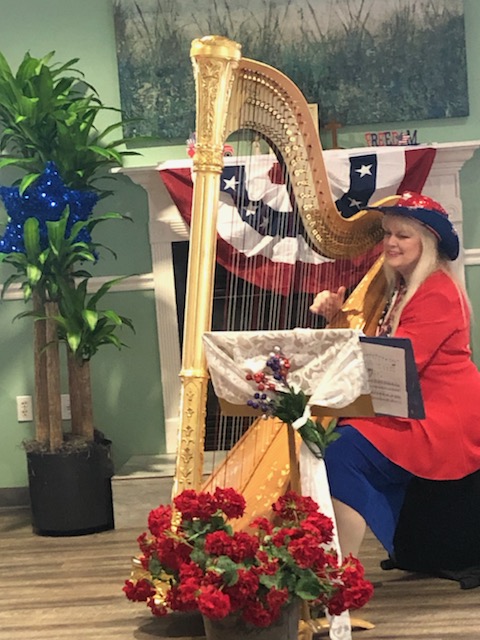 playing harp for assisted living residents
