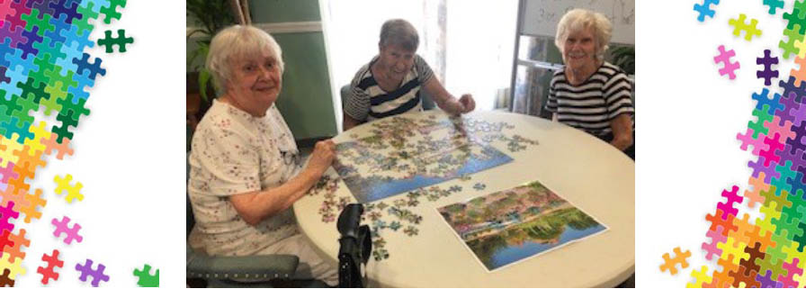 assisted living residents playing puzzle