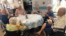assisted living residents enjoying ice cream