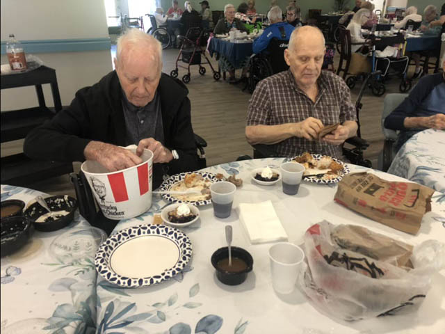 assisted living residents enjoying their luncheon