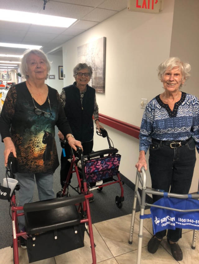 assisted living residents staying active and enjoying friendships