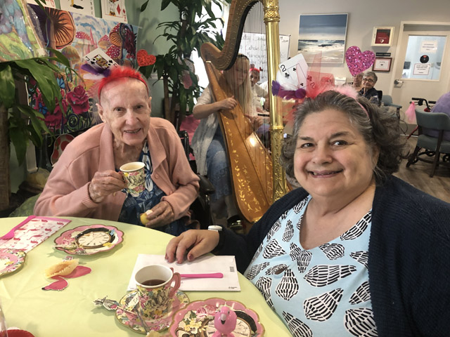 happy assisted living residents at the Alice in Wonderland tea party at Cabot Cove of Largo