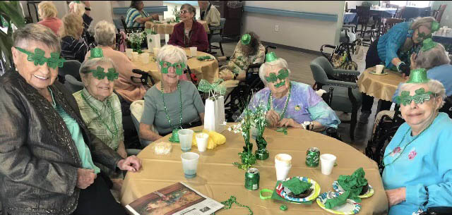 assisted living residents celebrating St Patricks Day