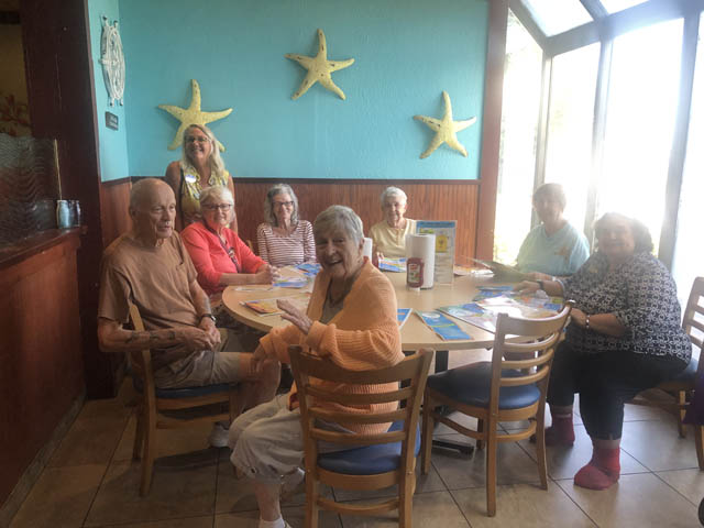 assisted living seniors at lunch outing
